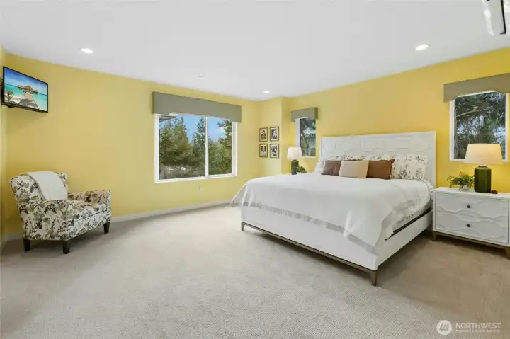 Very spacious primary en suite! This TV stays too.