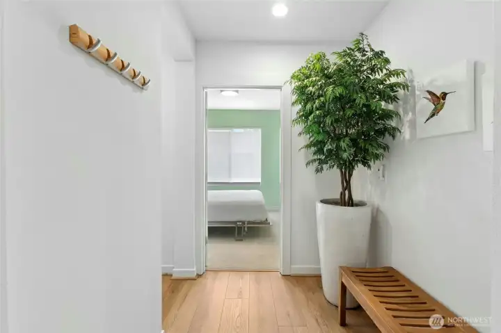 Great space just to the left of the elevator. Straignt leads into bed #2 and to the left is a wonderful hallway for shoes, cleaning equipment, etc.