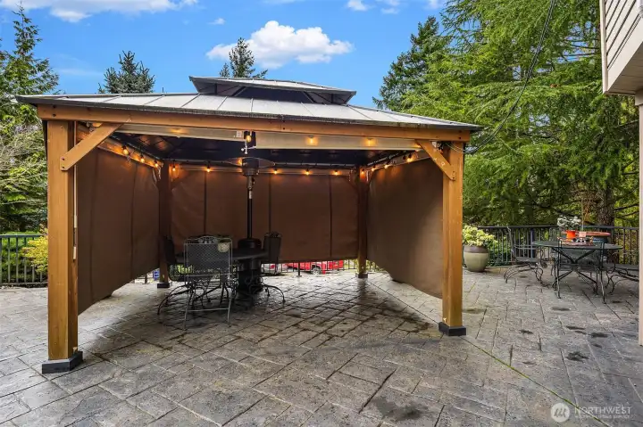 Large stamped concrete patio with gazebo