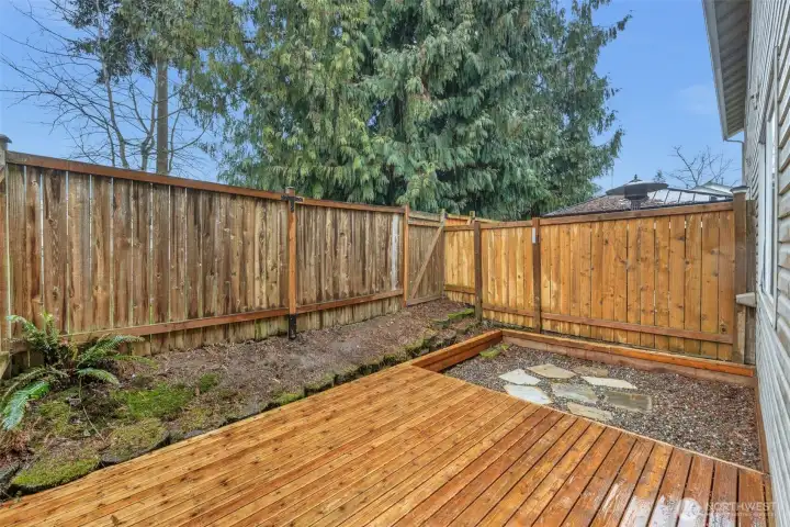 rear deck and yard area. Ready for your social gatherings.