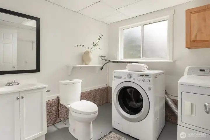 Laundry and half bath located on lower level.