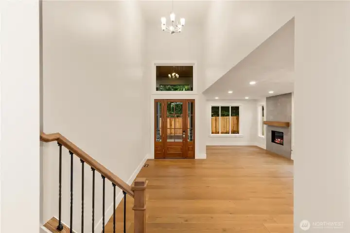 Foyer with soaring ceilings leads to Formal Living Room and Dining Room