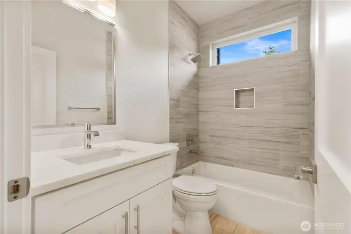 Main floor Full Bathroom with Tub
