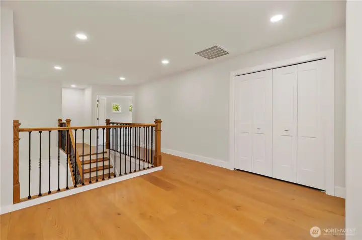 Generous landing and hall with Linen closet
