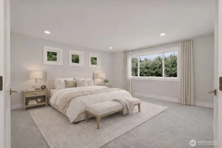 Virtually Staged Double doors lead to a generous, light-filled primary suite retreat