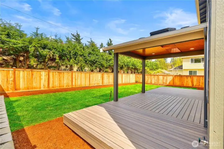 Covered Back Deck with Skylights and Integrated Lighting