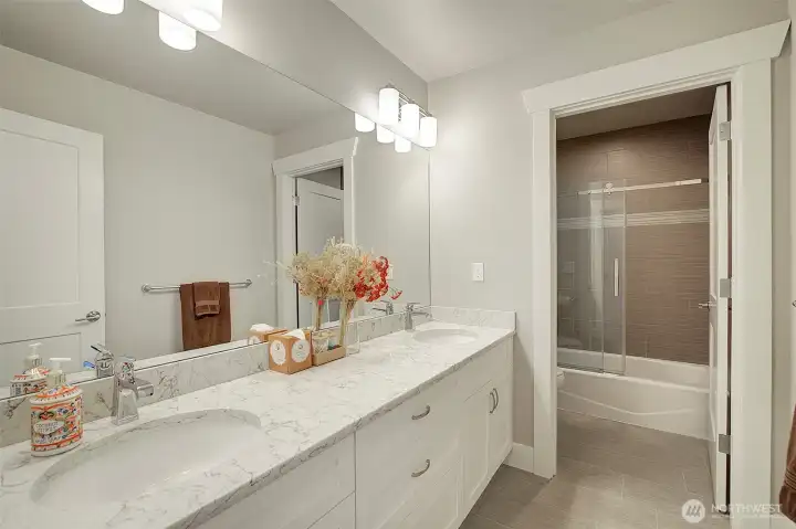 Guest Bath Upstairs with double vanity.