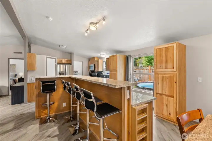 Kitchen with Large Island w/Eating Bar (partially digitally stage)
