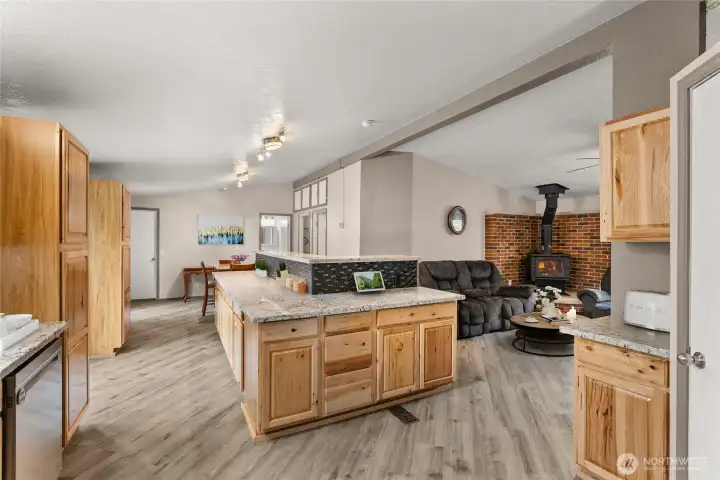 Kitchen with LVP Flooring installed on Diagonal (partially digitally stage)