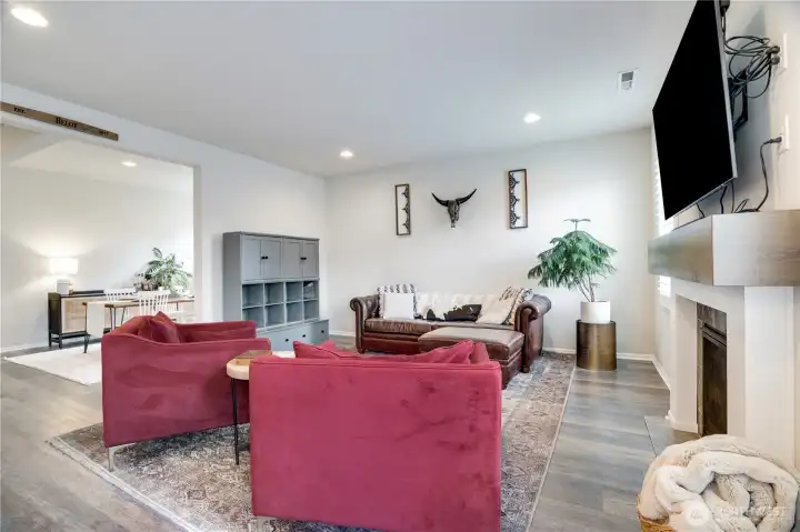 The main floor is incredibly spacious and open. The finishings of walls, flooring lighting and window treatment is pristine.