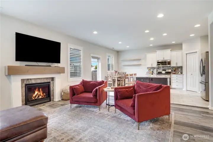 Centrally located gas fireplace centers the open living room. This home has central air conditioning to keep you comfortable during the summer months.