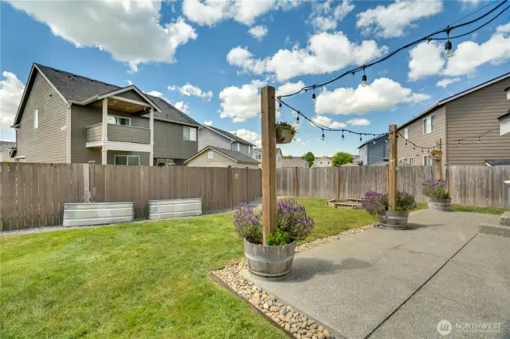 The owners expanded the patio space. The backyard has great space for BBQ’ing, relaxing and play