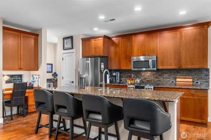 Space for at least 4 stools at your island counter and you also have a built-in desk for sorting mail, sending a card, or writing your grocery list Space for at least 4 stools at your island counter and you also have a built-in desk for sorting mail, sending a card, or writing your grocery list