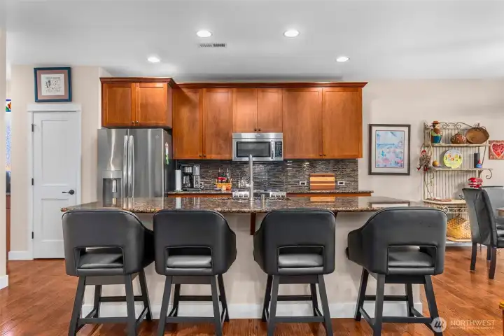 To the left of the Kitchen is a pantry, providing extra storage for dry goods and small appliances To the left of the Kitchen is a pantry, providing extra storage for dry goods and small appliances