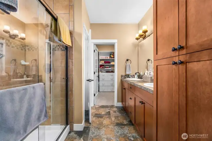 Primary bedroom ensuite bathroom with dual sinks and tons of storage Primary bedroom ensuite bathroom with dual sinks and tons of storage