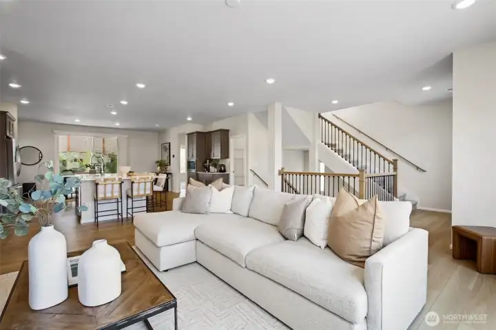 Open floor plan on main with living dining and kitchen area - open and airy. Open floor plan on main with living dining and kitchen area - open and airy.