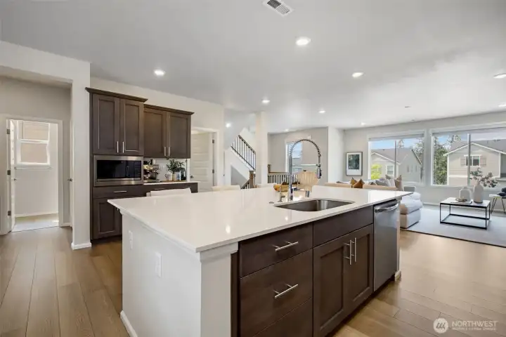 Undermount sink in large island with gorgeous slow-close cabinetry and luxury finishes. Undermount sink in large island with gorgeous slow-close cabinetry and luxury finishes.