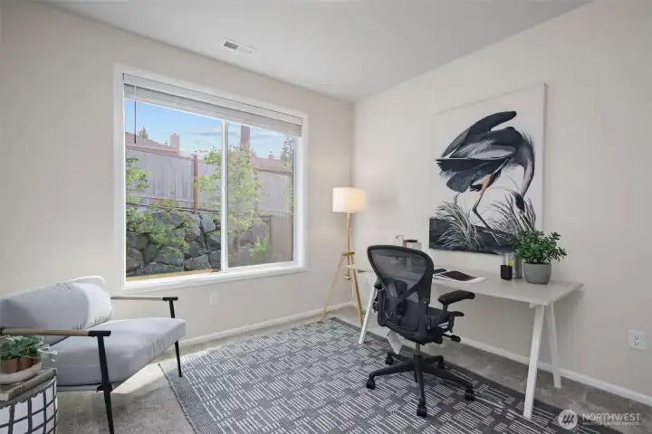 Currently used as an office, this spacious 4th bedroom sits on the main floor overlooking the back garden. Currently used as an office, this spacious 4th bedroom sits on the main floor overlooking the back garden.