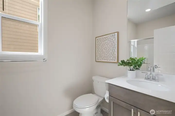 Bathroom on main with walk-in shower. Bathroom on main with walk-in shower.