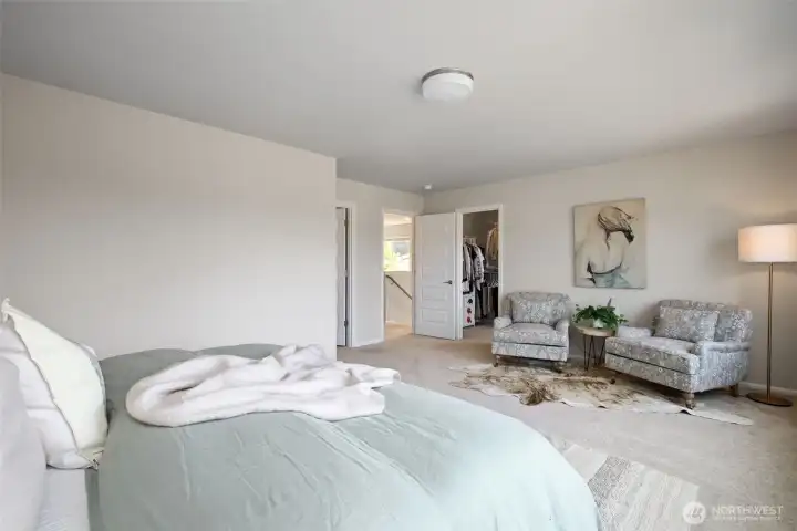Spacious primary bedroom ensuite with walk-in closet. Spacious primary bedroom ensuite with walk-in closet.