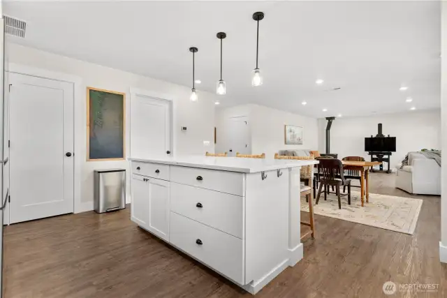 Extra storage in the island, and pantry space behind the door on the left.