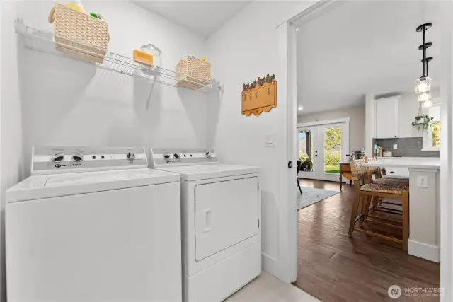 Laundry room off the kitchen, for convenience.