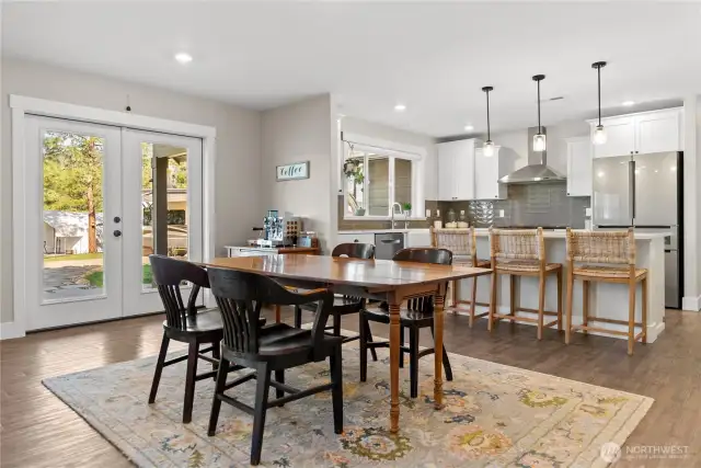 French doors lead to the covered back patio.