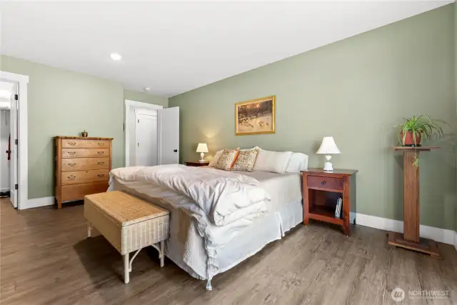 The spacious primary bedroom includes a walk-in closet.