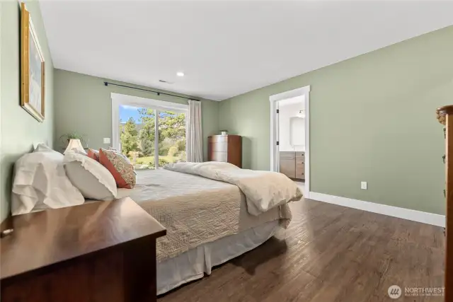 Awaken to beautiful views from your primary bedroom.