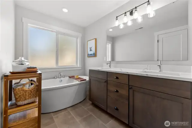 En suite bathroom, complete with soaking tub.