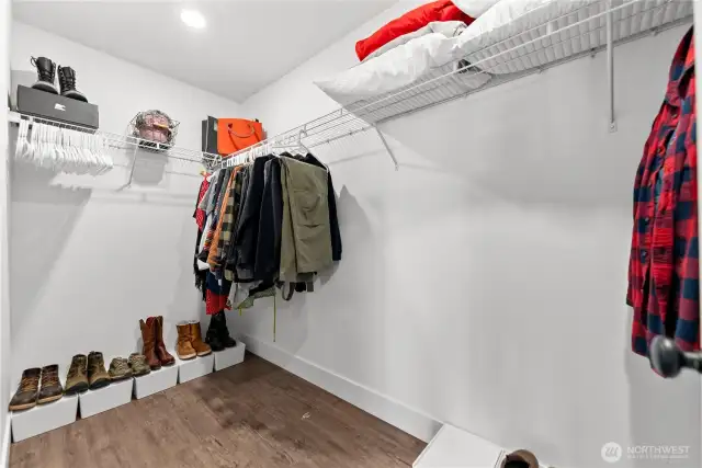 Walk-in closet in the primary bedroom.