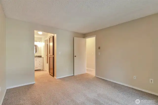 The primary bedroom is easily big enough for any-size bed and is shaded by mature landscaping, making this room a quiet and calming retreat. And extra storage allows you to bring it all with you!