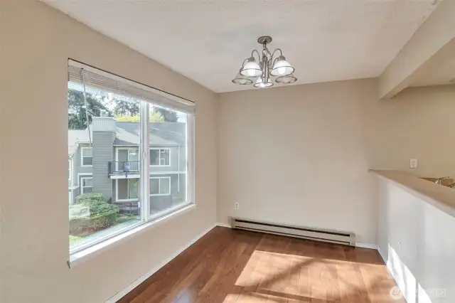 Mealtime made effortless with a breakfast bar & kitchen that opens to the dining area!