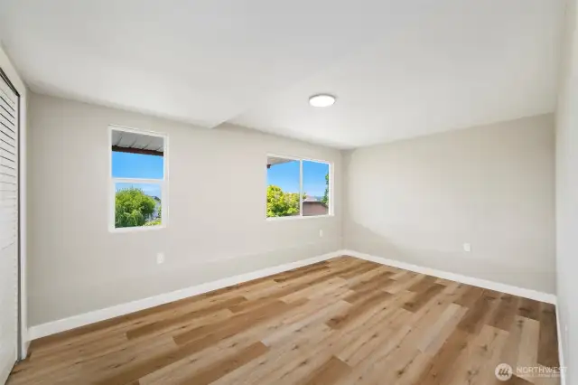 Peaceful and private bedroom with neutral tones and updated finishes—ready for personalization.