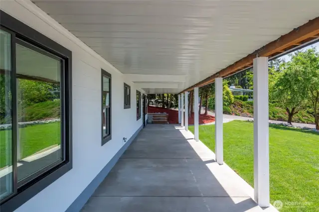 Shaded lower patio extends your outdoor living season—perfect for play, pets, or quiet evenings under cover.