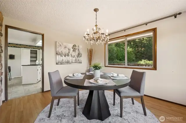 The dining room window doesn’t just bring in light, it frames your private view of Capitol Land Trust’s protected acreage like it’s your own personal landscape architect. Slide open the door to the deck, or keep it all eyes-forward on the trees. Curtain hardware is already in place, waiting for your fabric of choice.