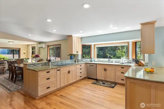 A kitchen designed for hosting! Enjoy holidays, parties and gatherings without missing any of the action in your open kitchen. Craft culinary experiences with a chef's counter, created with bar top seating in your kitchen.