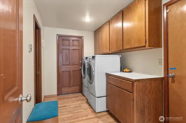 Your mudroom offers dual access! Come in from outside after a day of gardening or from working in your garage or step inside after parking your vehicle in your attached 2 car garage. Either way, the mess stops here with the convenience of your laundry room to toss all your work wear into.