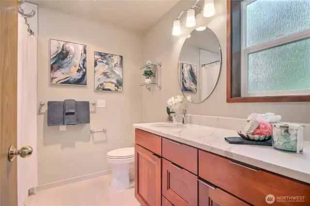 Total bathroom update with granite/tile.