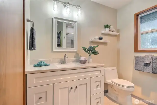Total bathroom update with granite/tile.