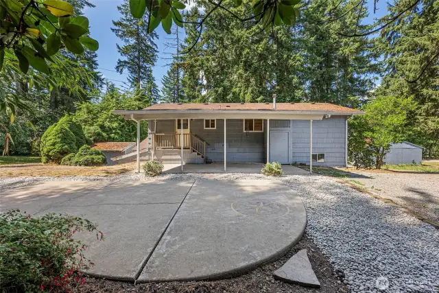 Upper level covered patio and private entrance.