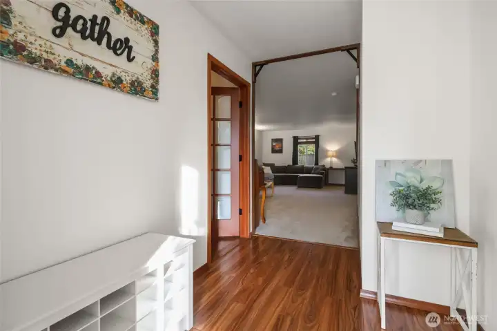 Cool trim detailing as you enter, and beautiful french door to office on left.