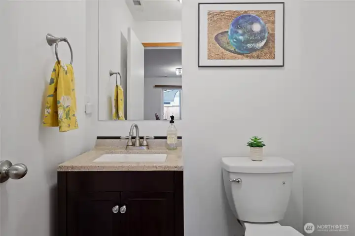 1/2 bath off the kitchen makes for ultra main floor convenience.