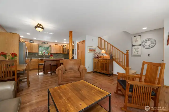Another view showing how open the living room, dining area and kitchen are. The beautiful fir trim and doors make a statement.