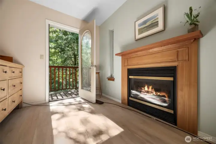 The primary bedroom has its own private deck and also has a gas fireplace like the one in the family room.
