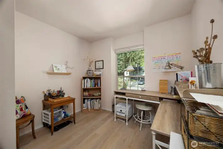 This is another bedroom that takes in the views of the front landscape.