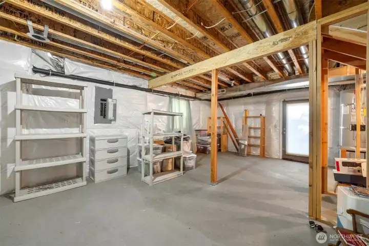 The lower level has a door that comes off the rear yard (below the kitchen) and could easily be finished as additional living space or an ADU.