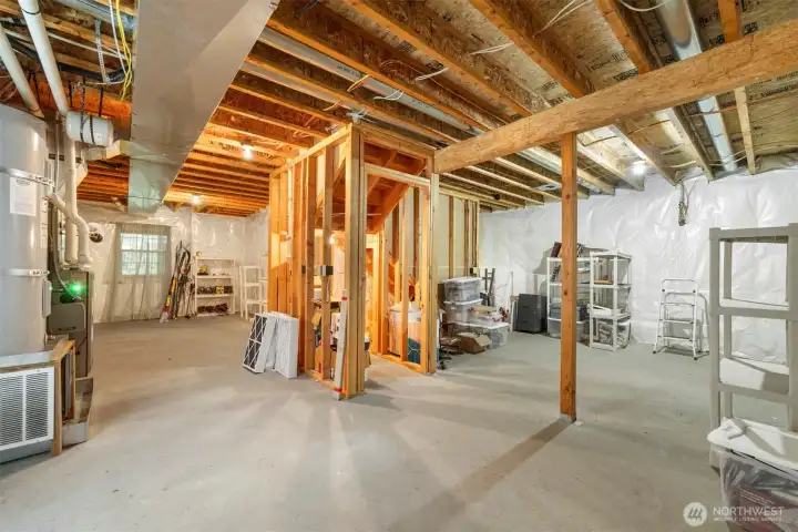 The furnace and hot water heater are in the lower level that is fully insulated and ready for sheetrock.