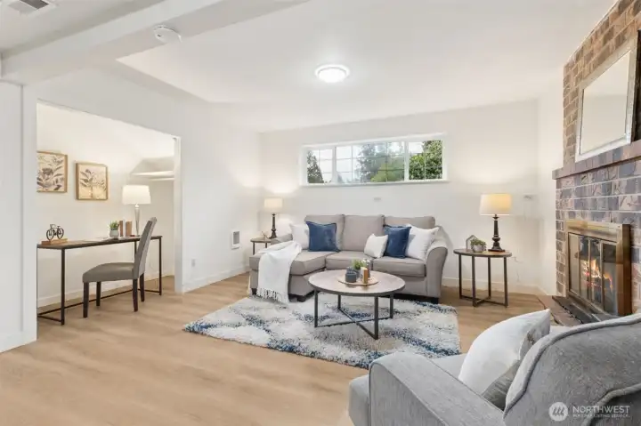 The desk nook could be used as a closet if you want to turn this space into a bedroom. OR, put up shelves for a great place to store books & games!