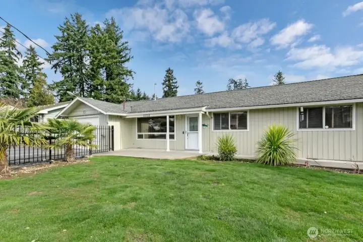 Front yard, real grass, for lower maintence install astrotruf